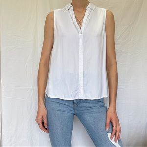 White sleeveless collar button-down blouse